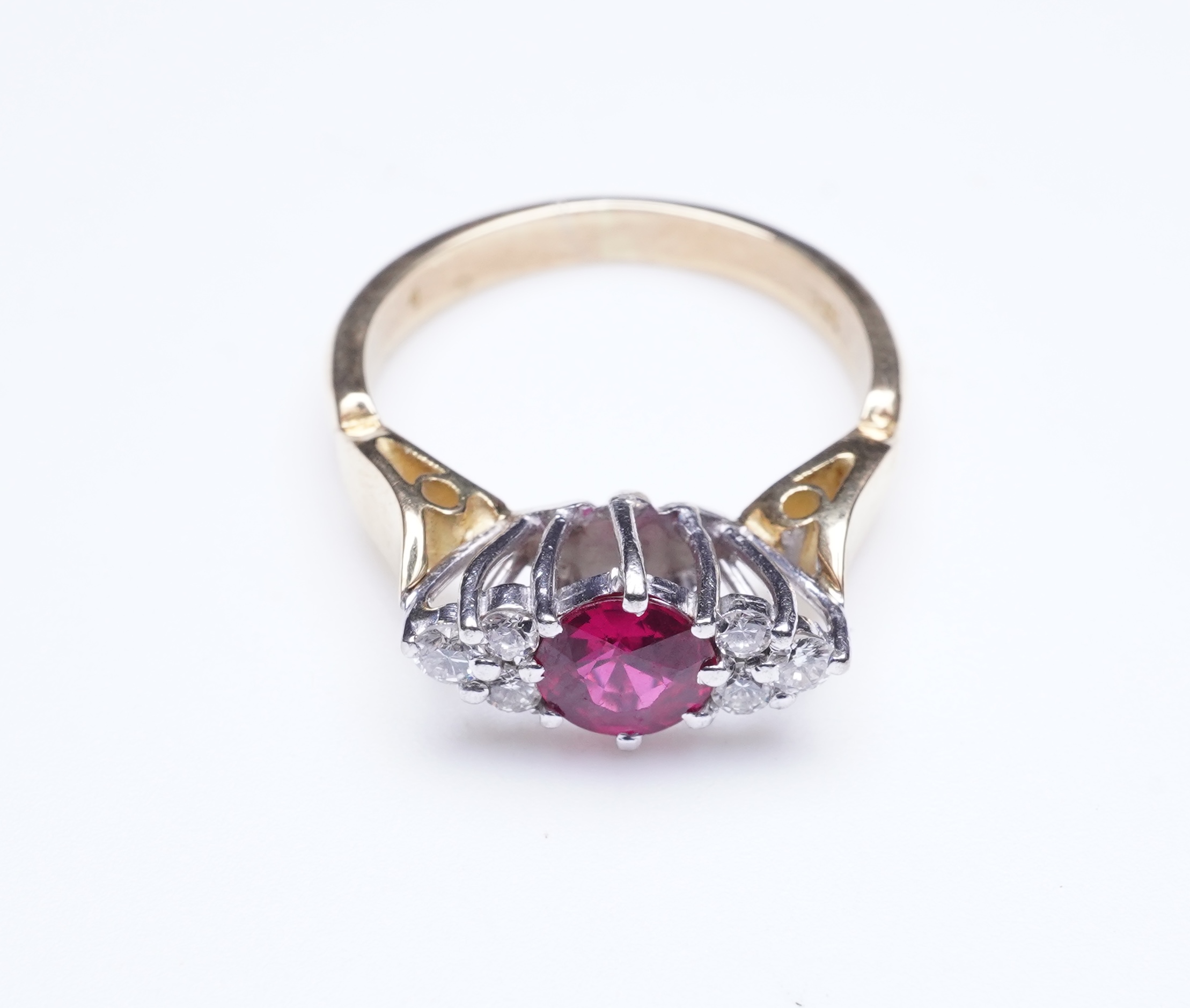 A synthetic ruby and diamond ring